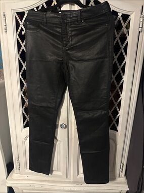 Chico’s platinum stretchy faux leather denim jeans